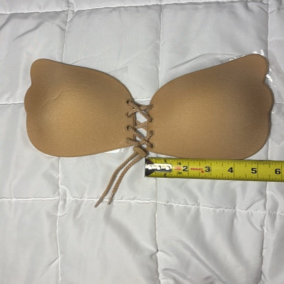 Cleavage Pal Backless and Strapless
Adhesive Lace Up Bra - Picture 3 of 9